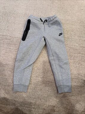 Nike Tech Grey Kids Fleece Joggers with Black Zip Pocket